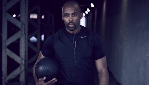 Don Scott holding medicine ball