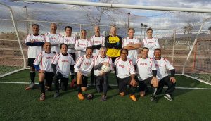Soccer team smiling for a photo