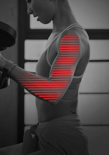 close up of woman's bicep as she lifts weight