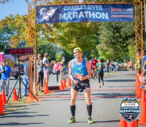 althea celebrating at the end of Charles River Marathon