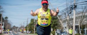 John Young thumbs up during race