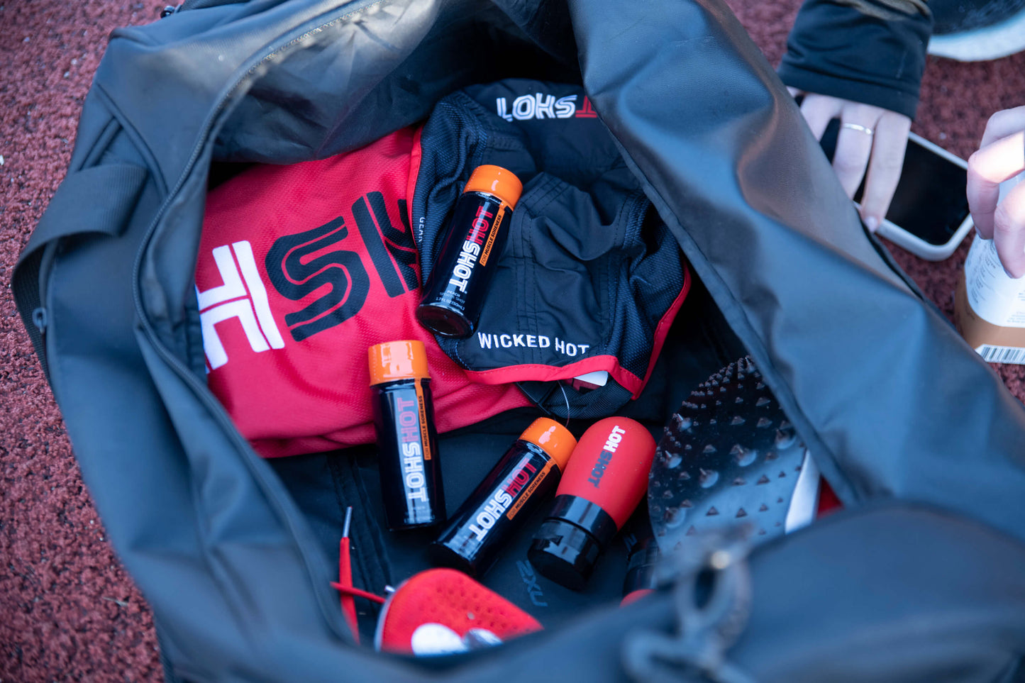 HOTSHOT Athletic Shots for Muscle Soreness Shots and squeeze bottle in Athletic Bag
