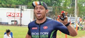 athlete with tongue out holding HOTSHOT