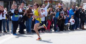 Fans cheering at mile 20 of the Boston Marathon