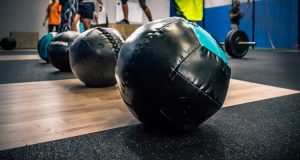 Medicine balls in line in gym