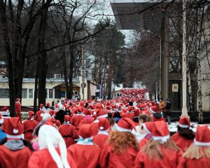 group of people wearing holiday hats