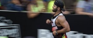 athlete running with blurred background