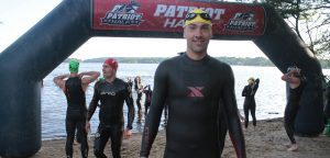 swimmer at the finish of the patriot half